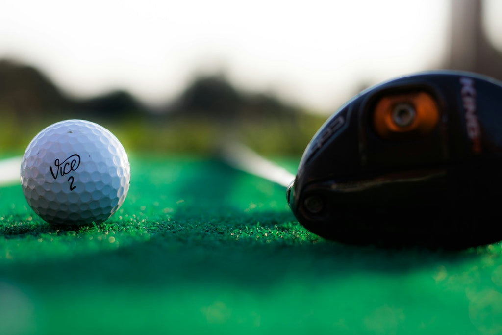 Image of a golf course with people playing golf