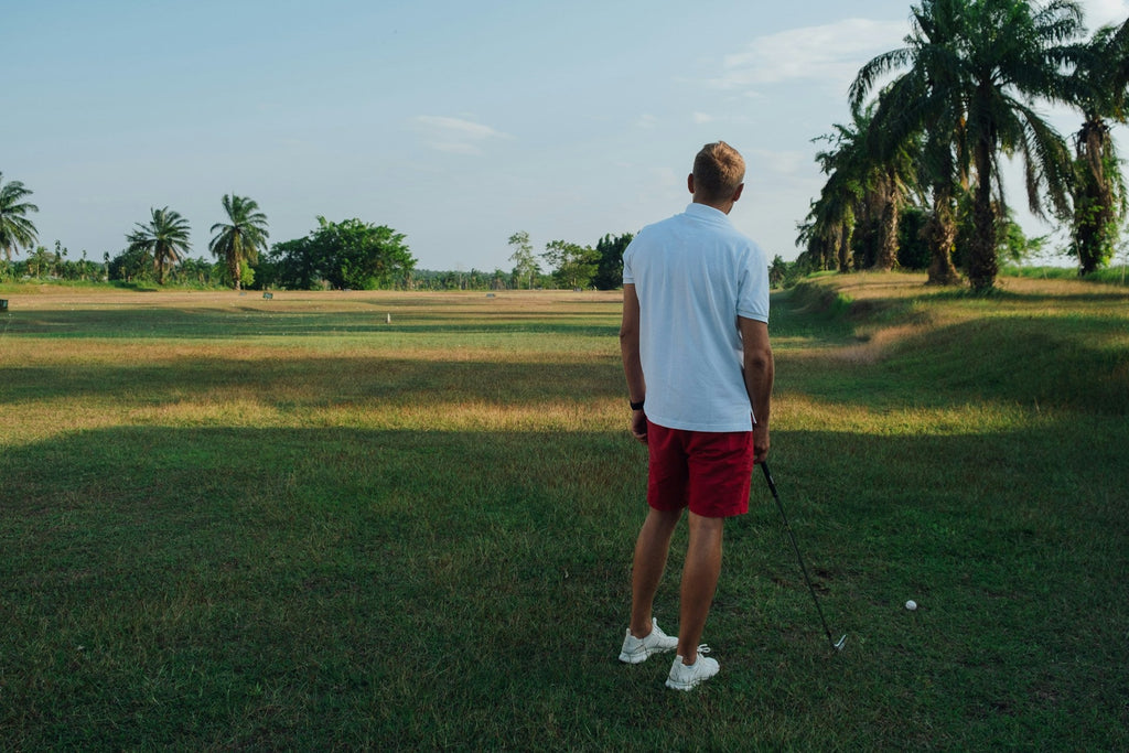 Image of a golf course with people playing golf